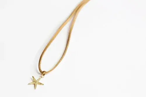 Small Sterling Silver Sea Star Charm on Faux Suede