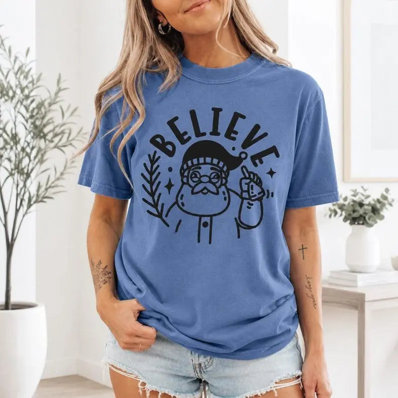Believe Santa Claus Vintage Line Art Graphic T-Shirt | Cornflower Blue Christmas Holiday Cotton Tee