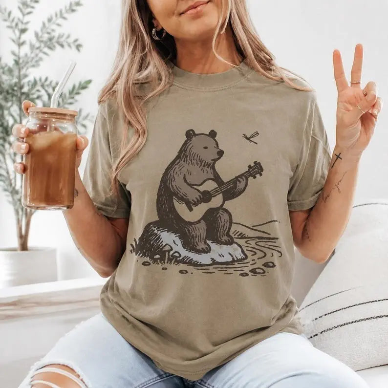 Acoustic Guitar Bear Riverbank Graphic T-Shirt | Khaki Folk Music Cottagecore Cotton Tee