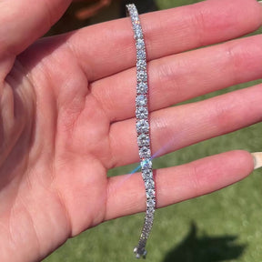 THE “JAIMIE” 4 PRONG GRADUATED TENNIS BRACELET