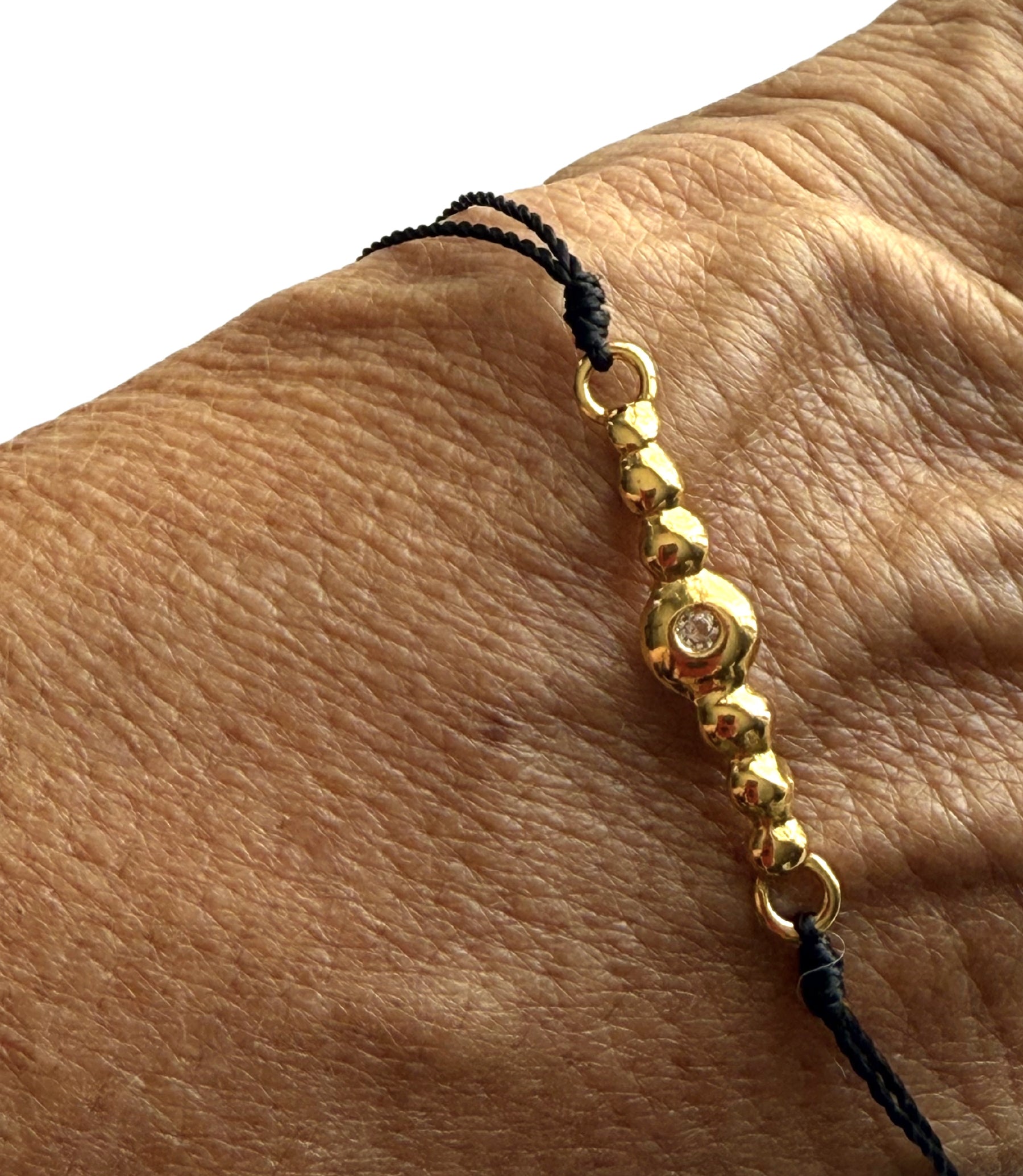 : /AH-MI/ Friendship & Travel Bracelet 24K Black Cord