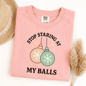 Stop Staring At My Balls Graphic T-Shirt | Funny Christmas Ornaments Light Pink Cotton Tee
