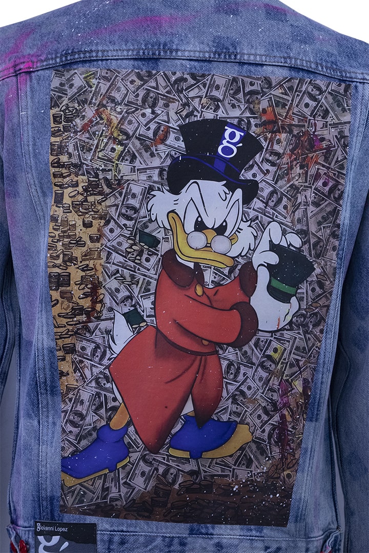 Blue denim jacket with cartoon print