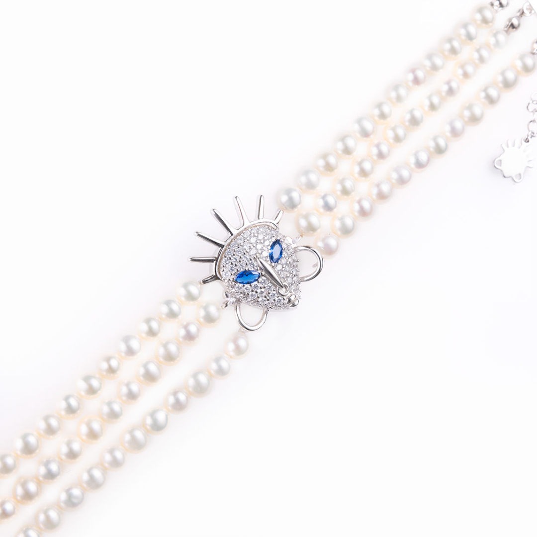 Ìdòlá Triple-Strand Pearl Bracelet with Sapphire-Eyed Mask