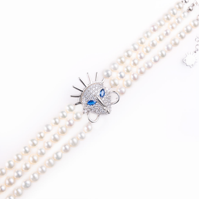 Ìdòlá Triple-Strand Pearl Bracelet with Sapphire-Eyed Mask