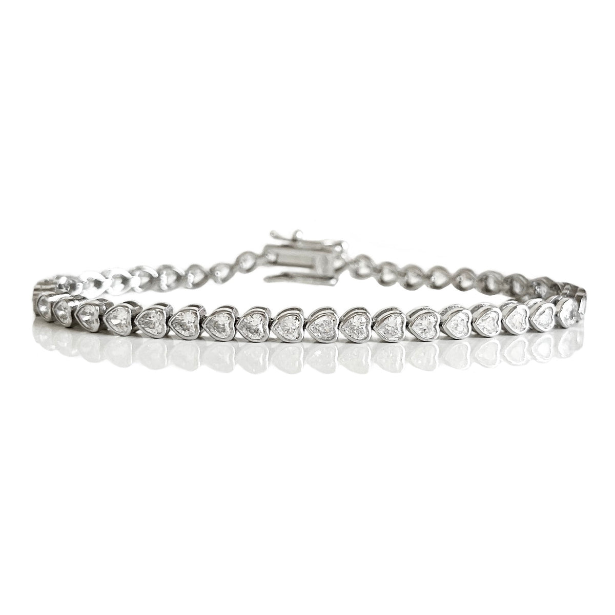 THE “MARIE” HEART BEZEL TENNIS BRACELET