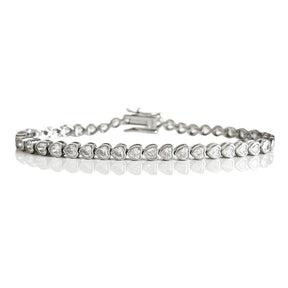THE “MARIE” HEART BEZEL TENNIS BRACELET