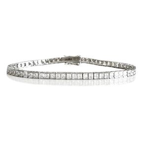 THE PRINCESS CUT CHANNEL SET TENNIS BRACELET