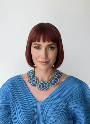 CRISSCROSSED CIRCLES NECKLACES