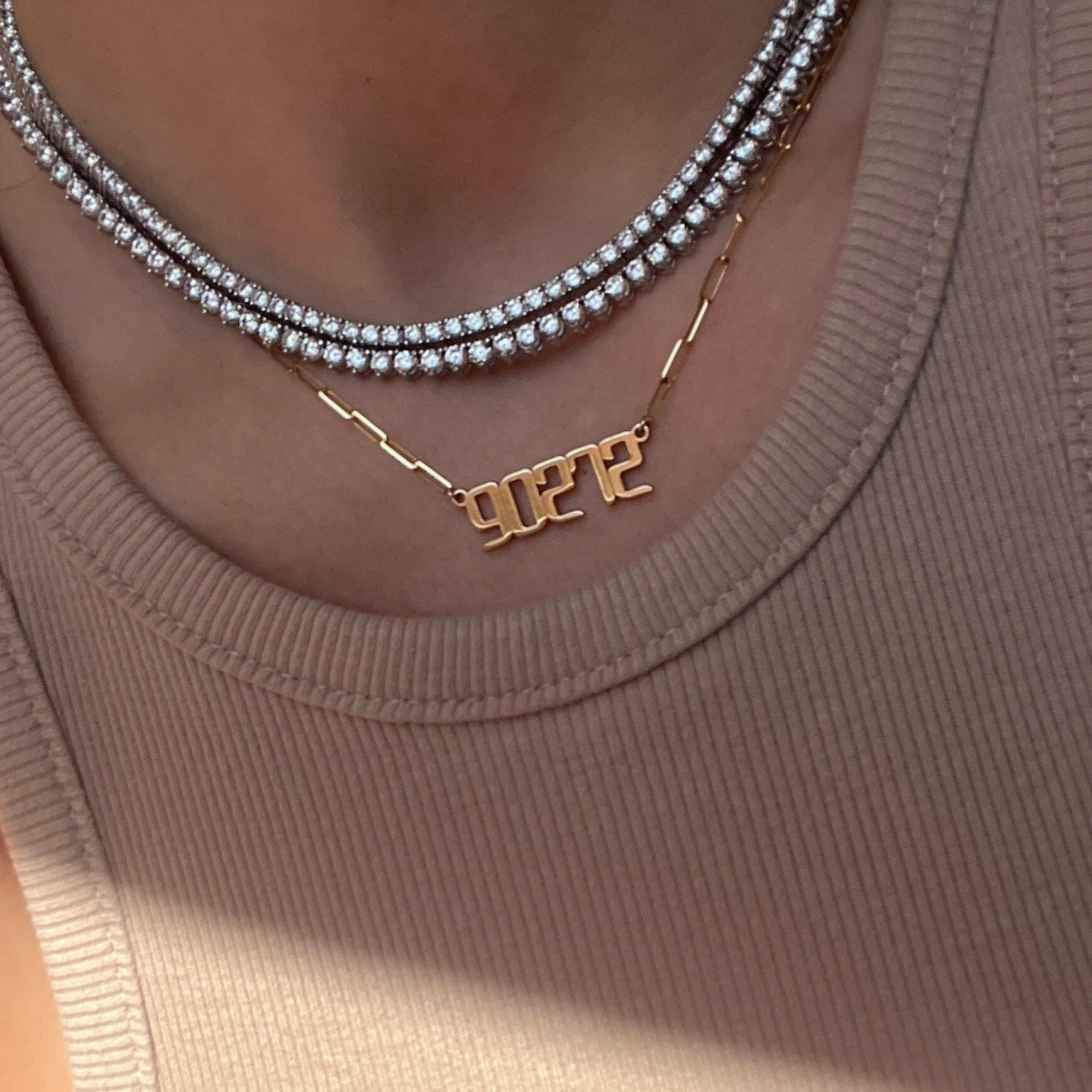 THE SIGNATURE “90272” NAMEPLATE NECKLACE
