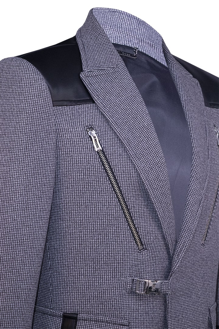 Blazer featuring faux leather accents and metal fittings