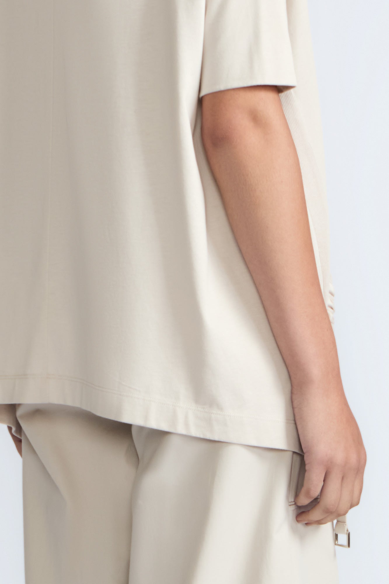 Amaya Asymmetric Buckle Top