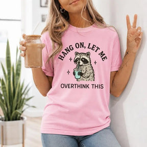 Hang On Let Me Overthink This Raccoon Graphic T-Shirt | Light Pink Funny Coffee Cotton Tee