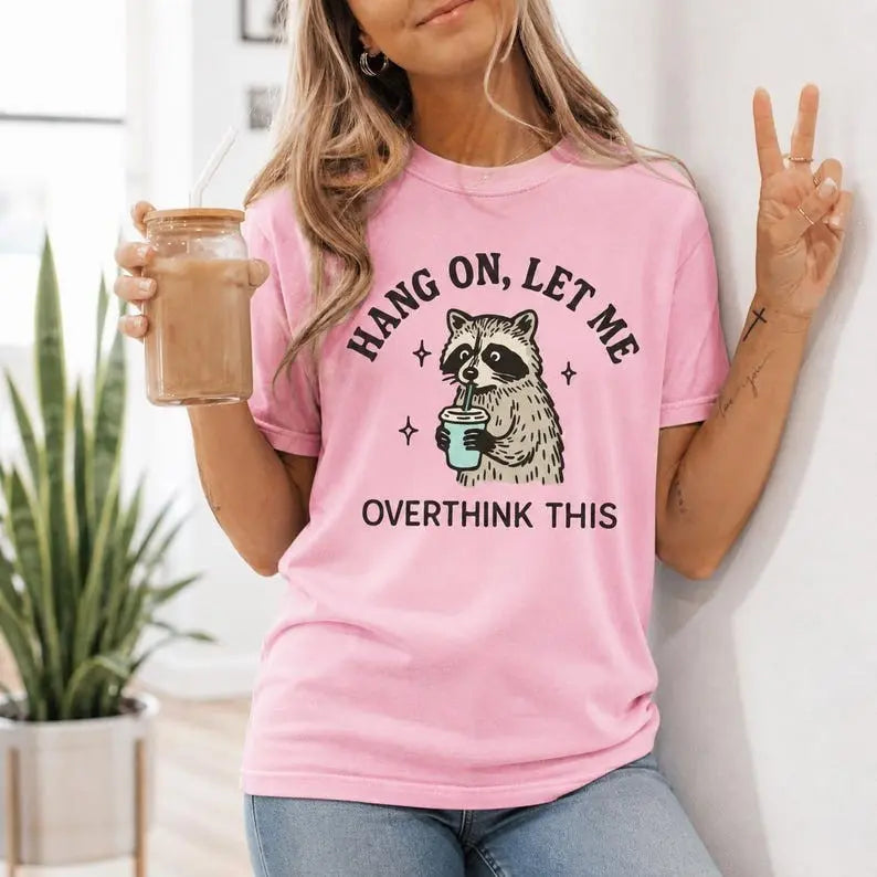 Hang On Let Me Overthink This Raccoon Graphic T-Shirt | Light Pink Funny Coffee Cotton Tee