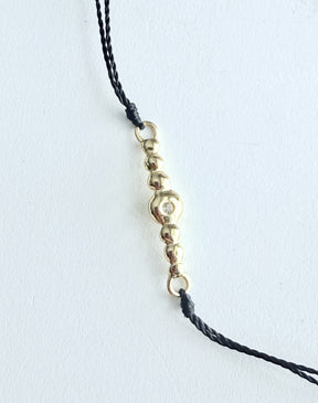 : /AH-MI/ Friendship & Travel Bracelet 24K Black Cord