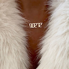 THE SIGNATURE “90272” NAMEPLATE NECKLACE