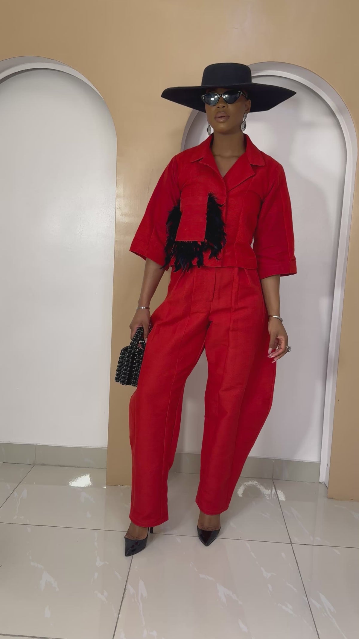 Nnekota Aso Oke Set – Red Two-Piece with Feathered Trimmings