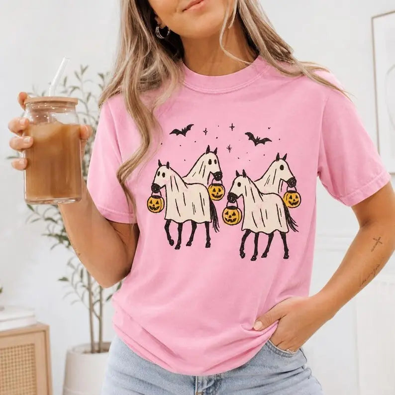 Ghost Horses Trick Or Treating Halloween Graphic T-Shirt | Light Pink Spooky Horse Lover Cotton Tee