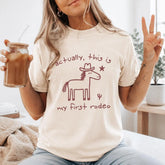 Actually This Is My First Rodeo Graphic T-Shirt | Funny Western Ivory Cotton Tee