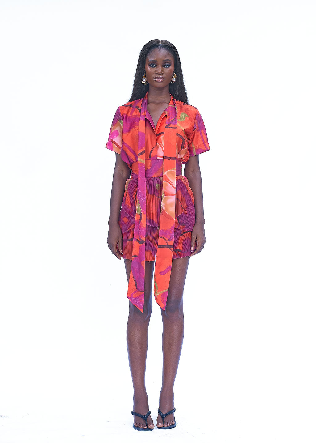 DONNA PLEATED SKIRT - ORANGE CALA