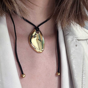 Bold Sculptural Gold Cord Necklace