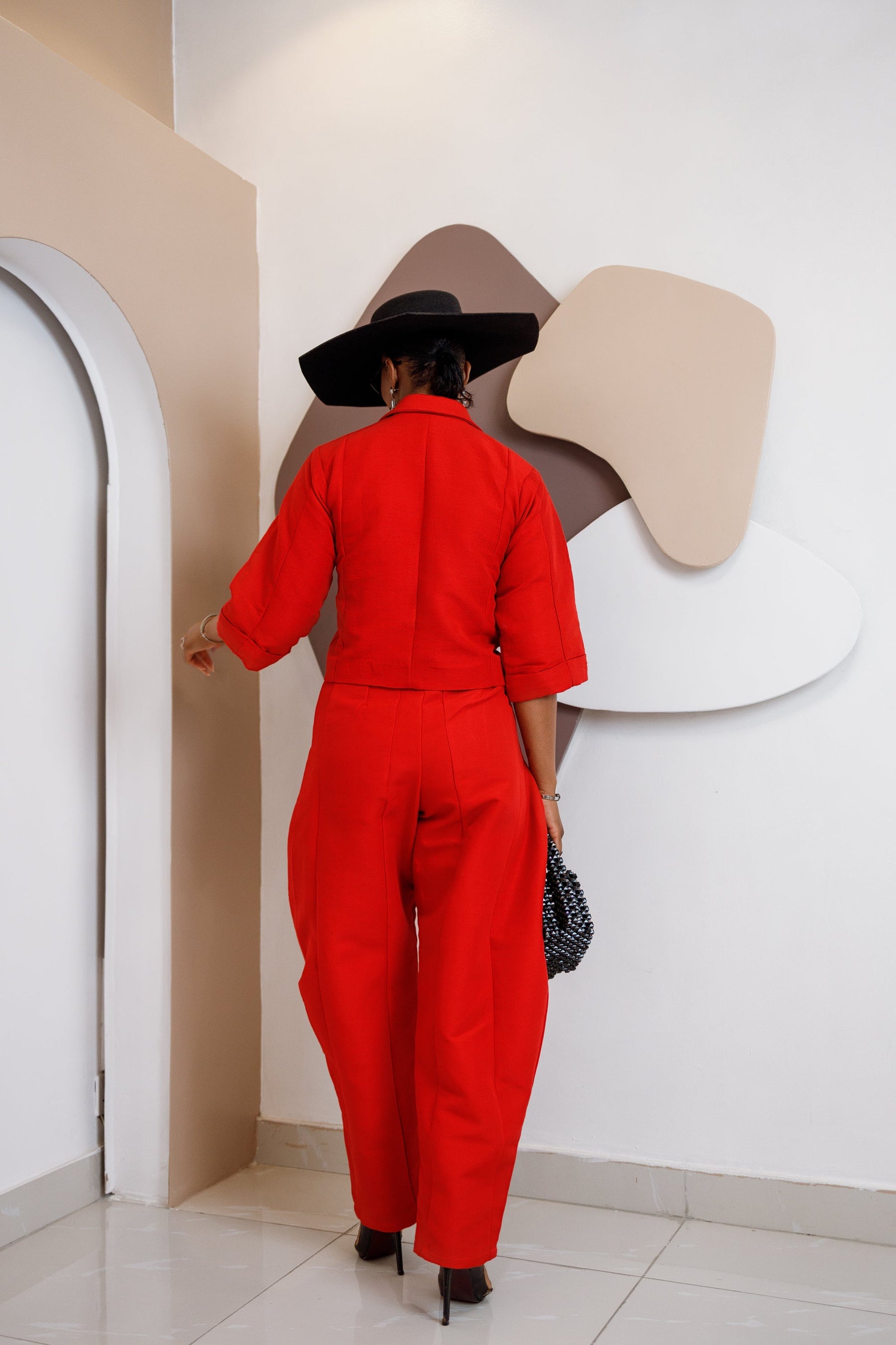 Nnekota Aso Oke Set – Red Two-Piece with Feathered Trimmings