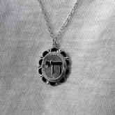 Chai Charm Necklace Sterling Silver Flower Frame
