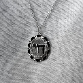 Chai Charm Necklace Sterling Silver Flower Frame