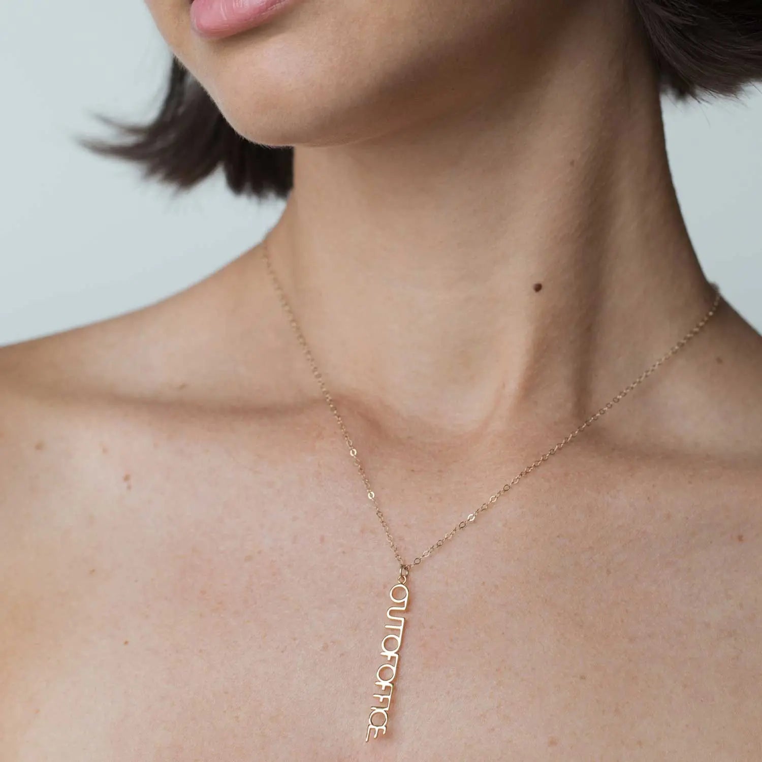 Out Of Office Gold Charm Necklace