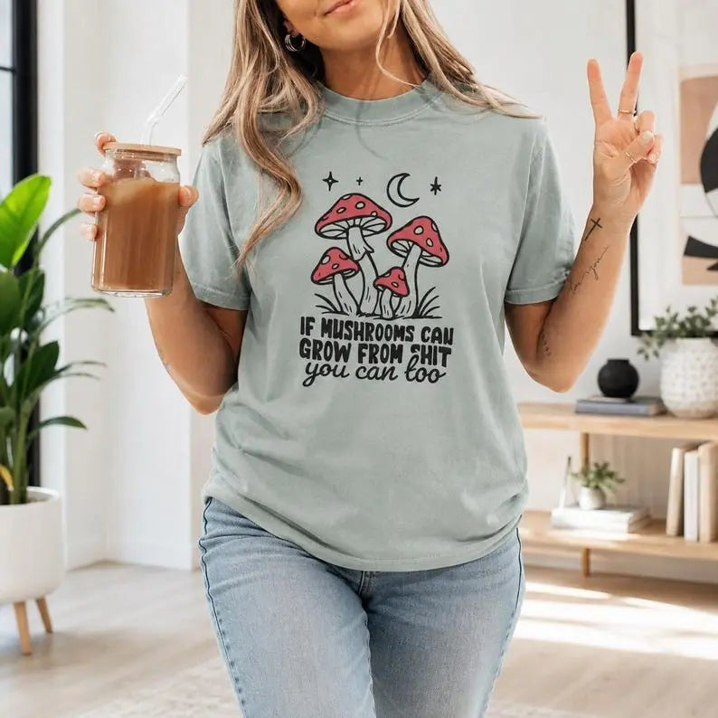 If Mushrooms Can Grow From Shit You Can Too Graphic T-Shirt | Sage Green Funny Cottagecore Cotton Tee