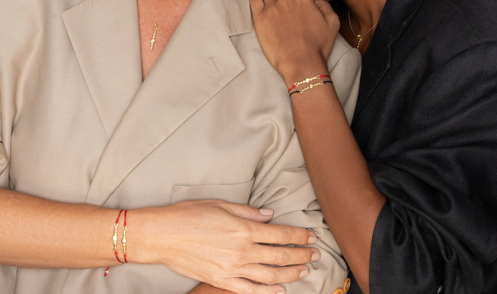 : /AH-MI/ Friendship & Travel Bracelet Sterling Silver Red Cord