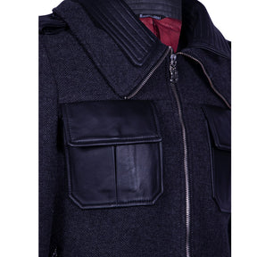 Wool jacket with a double collar and leather detailing.