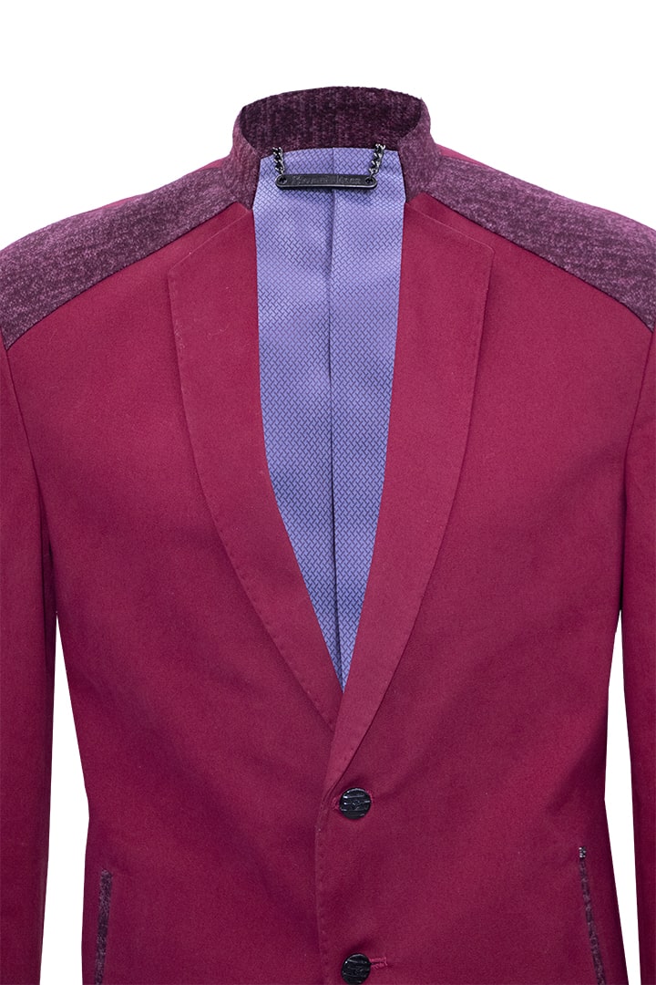 Wine red blazer with military collar and lapels.