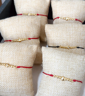 : /AH-MI/ Friendship & Travel Bracelet 24K Red Cord