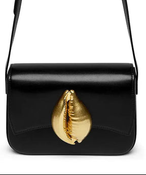 Sì Cowrie Shell