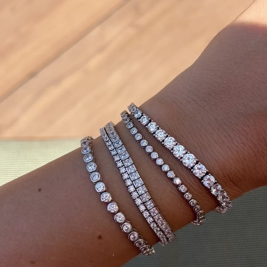 THE PRINCESS CUT CHANNEL SET TENNIS BRACELET