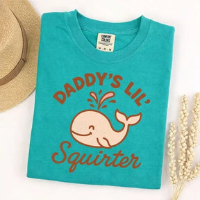 Daddy's Lil' Squirter Cute Whale Graphic T-Shirt | Funny Bright Teal Cotton Tee
