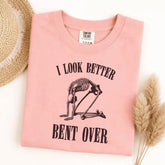 I Look Better Bent Over Skeleton Graphic T-Shirt | Funny Adult Humor Pink Cotton Tee