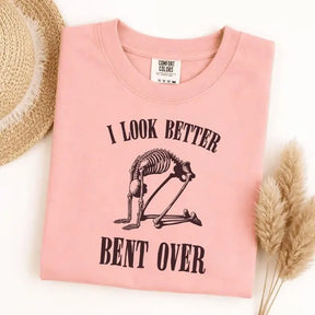 I Look Better Bent Over Skeleton Graphic T-Shirt | Funny Adult Humor Pink Cotton Tee
