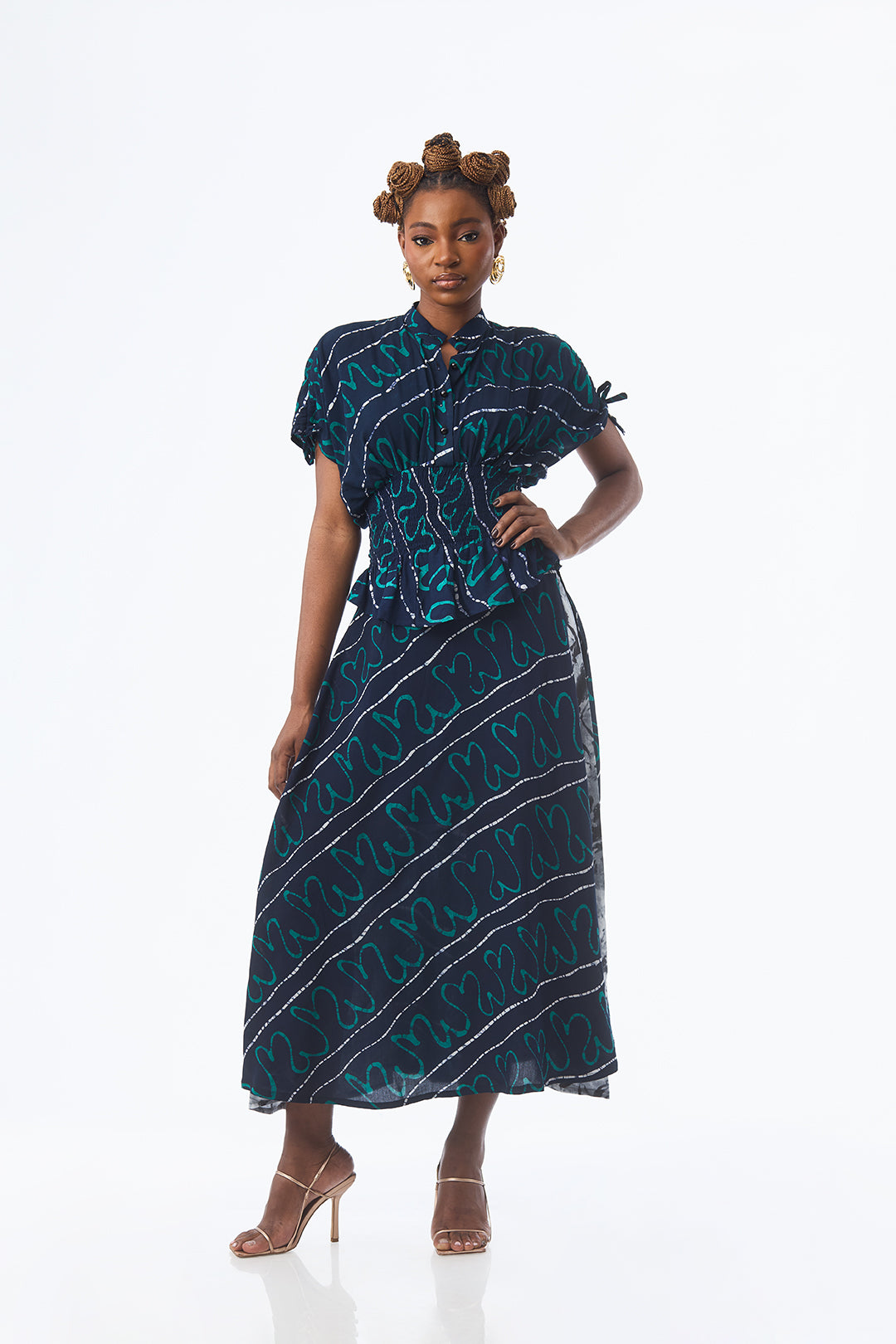 TEAL ABSTRACT WAVE SMOCKED PEPLUM BLOUSE