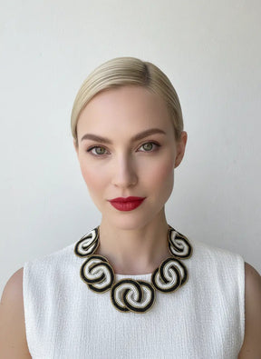 CRISSCROSSED CIRCLES NECKLACES