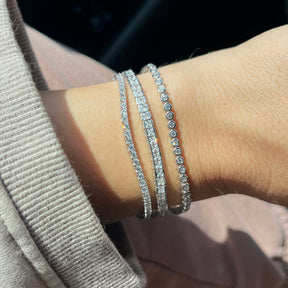 THE PRINCESS CUT CHANNEL SET TENNIS BRACELET