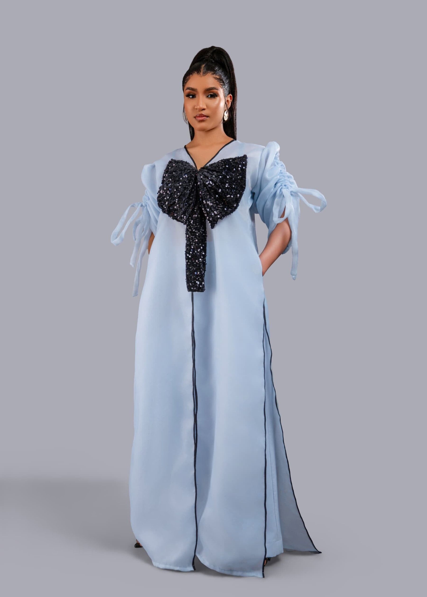 Blue kimono with black bow sequin and wide leg pant set.
