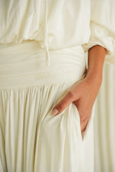 **Return Pant Ivory – Draped Wide-Leg Palazzo**