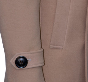 Beige double-breasted coat with wide lapels.