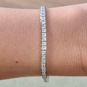 THE PRINCESS CUT CHANNEL SET TENNIS BRACELET