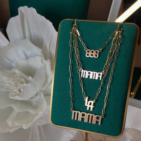 THE SIGNATURE “LA” NAMEPLATE NECKLACE