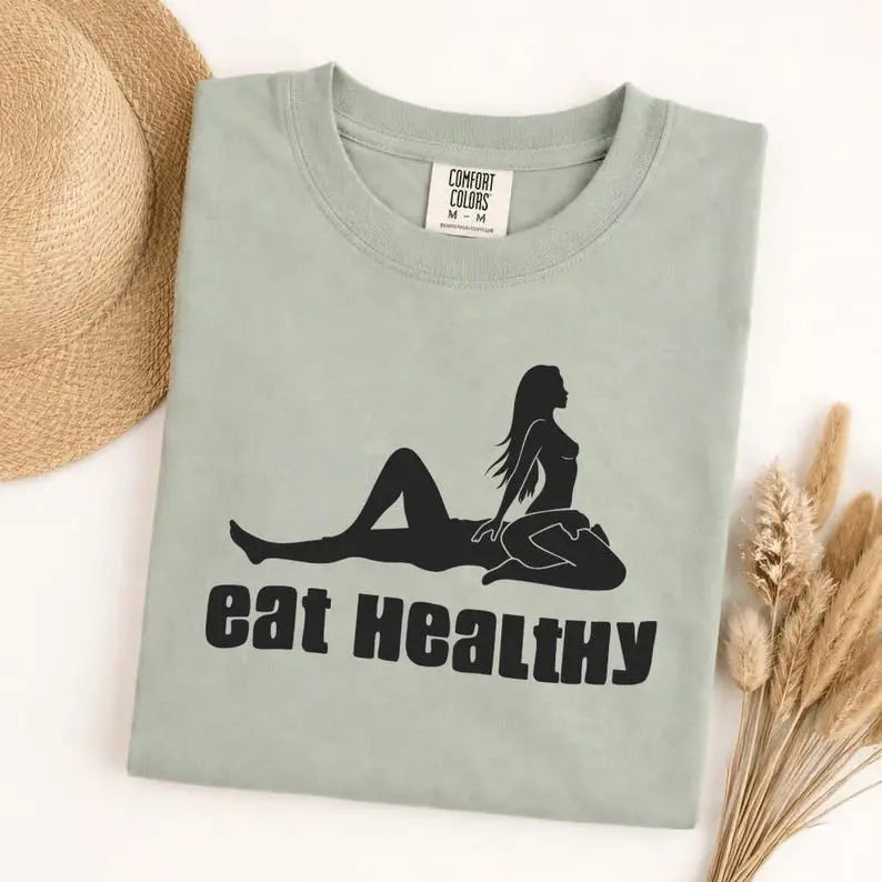 Eat Healthy Silhouetted Couple Graphic T-Shirt | Funny Adult Humor Sage Green Cotton Tee