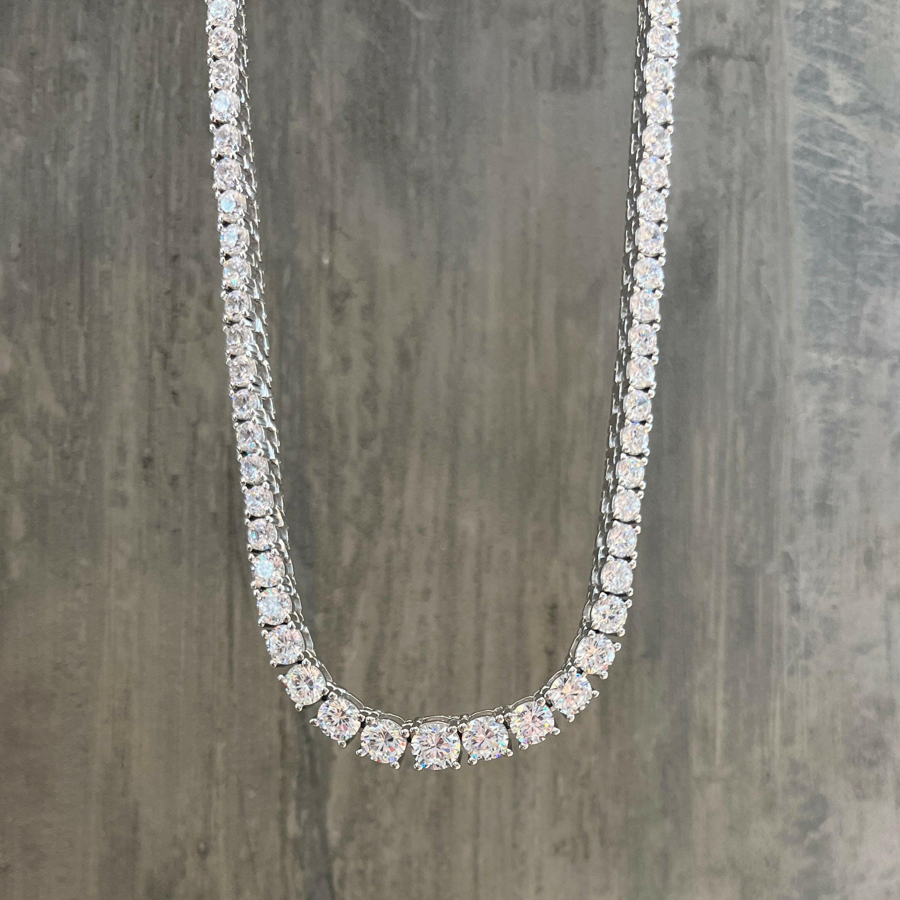 THE “JAIMIE” 4 PRONG GRADUATED TENNIS NECKLACE