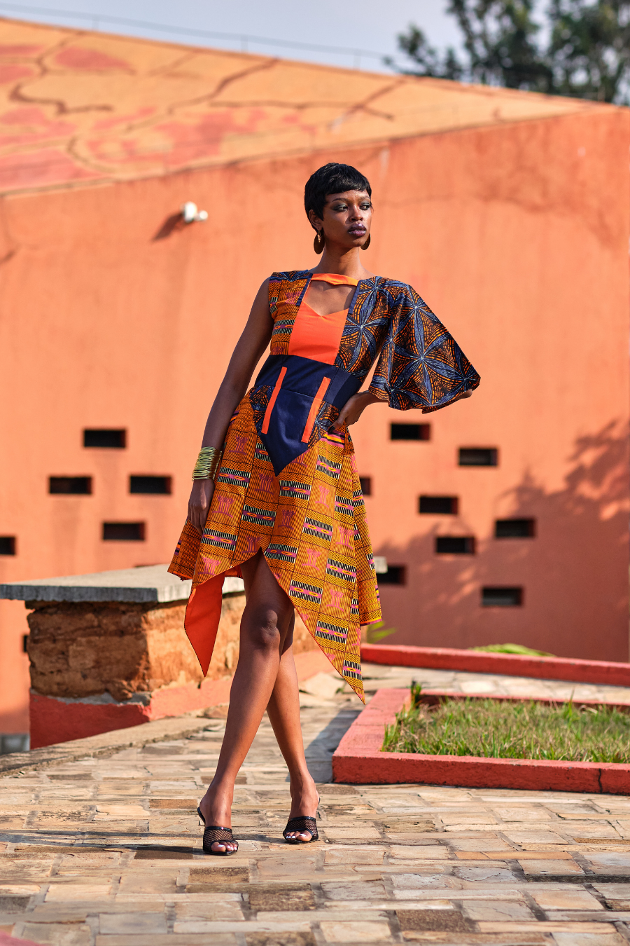 The Asymmetric Cape-sleeve Mini Dress